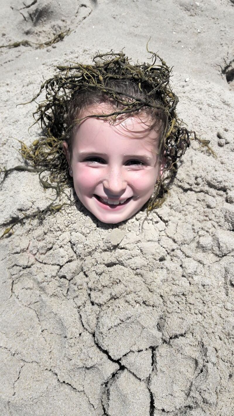 Sadbh Glavin having fun on the beach while on her summer holidays in Bandon, Co Cork. Photograph: Aidan Glavin