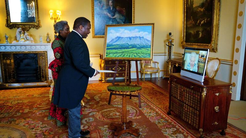 Queen Elizabeth appears via videolink from Windsor Castle during a virtual audience to receive the high commissioner of Malawi, Thomas Bisika. Photograph: Victoria Jones/PA Wire