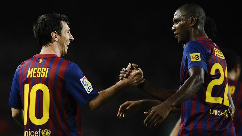Lionel Messi and Eric Abidal pictured playing together for Barcelona back in 2011. Photograph:  David Ramos/Getty Images