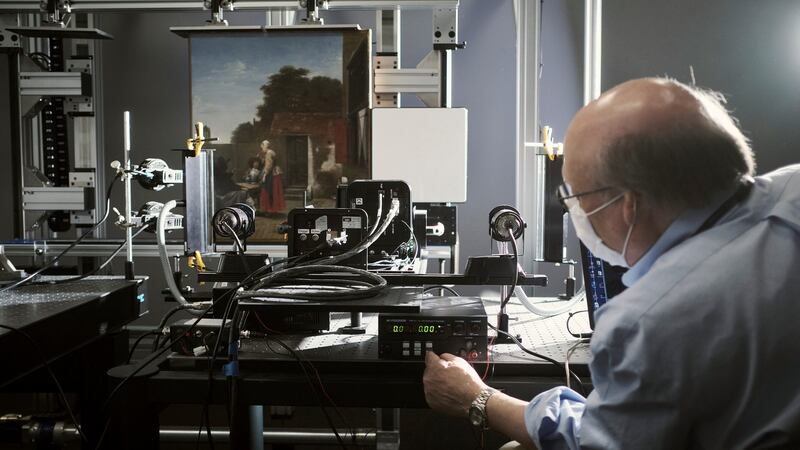 John Delaney prepares a hyperspectral visible wavelength camera to scan A Dutch Courtyard by Pieter de Hooch, at the National Gallery of Art in Washington DC. Photograph: TJ Kirkpatrick/The New York Times