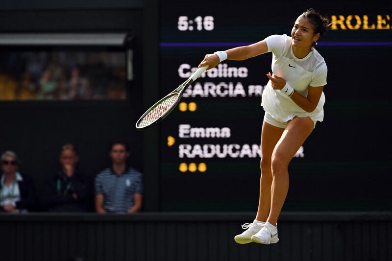 Emma Raducanu serves to Caroline Garcia during their match on the third day of the 2022 Wimbledon Championships. Photograph: Getty Images