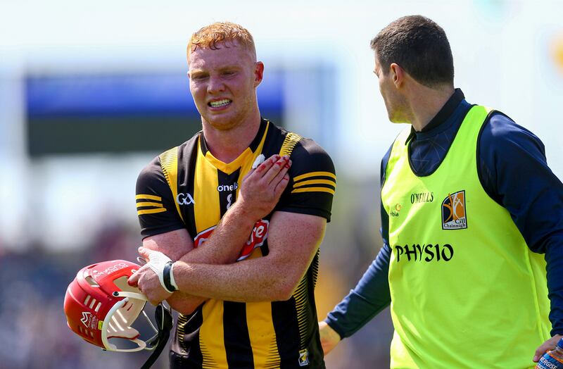 Kilkenny’s Adrian Mullen leaves the pitch in pain after injuring his hand against Wexford in the Leinster Championship last May. Photograph: Ken Sutton