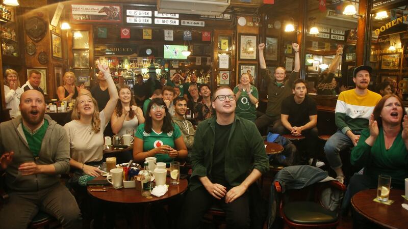 Rugby fans in Doheny and Nesbitt’s pub in Dublin: There should  be  a Haccp sticker on     indoor trade in bars and restaurants resuming on July 5th.   File photograph: Stephen Collins/Collins