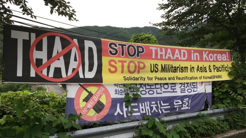 Anti-Thaad banners line the road to the former golf and country club which is now a US army base. Photograph: Peter Murtagh