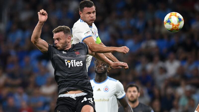 Dundalk’s Andy Boyle challenges for the ball with Vasil Bozikov of Slovan Bratislava during the Europa League third qualifying round, first leg at Tehelne Pole Stadium in Bratislava. Photograph: Ciaran Culligan/Inpho