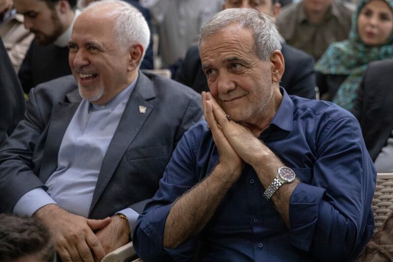 Newly-elected Iranian president Masoud Pezeshkian (right) during a visit to the shrine of the Islamic Republic's founder Ayatollah Ruhollah Khomeini on July 6th. Photograph: Majid Saeedi/Getty Images