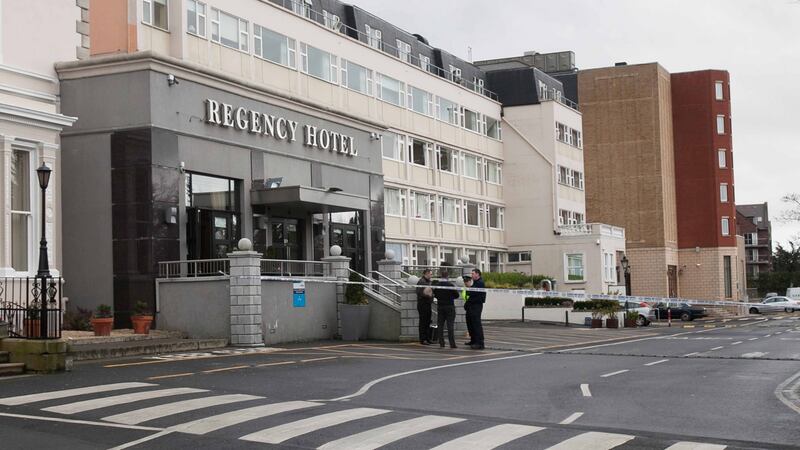 Members of An Garda Síochána stand outside the Regency Hotel following the fatal shooting of David Byrne in February 2016. Photograph: Gareth Chaney/ Collins