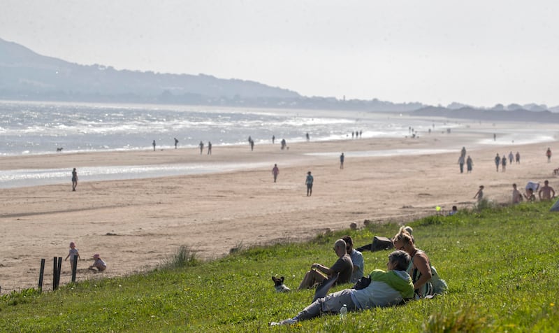 People enjoy the good weather at Portmarnock. Photograph: Colin Keegan/Collins Dublin