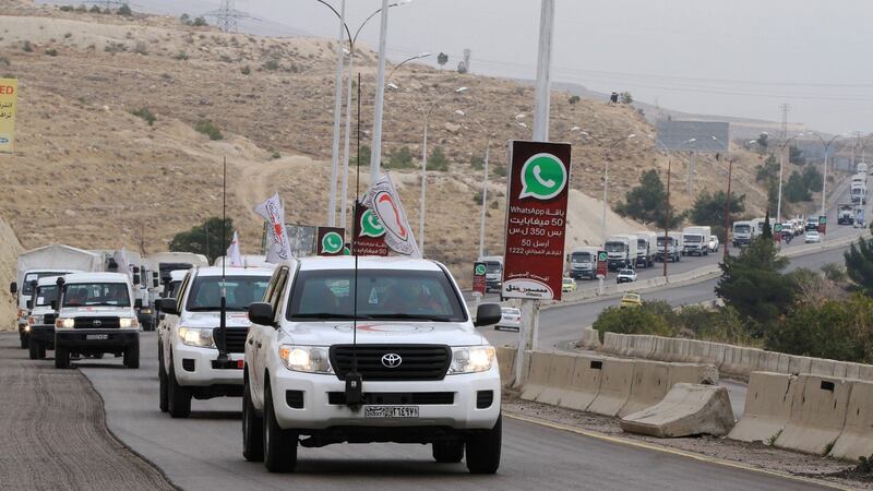 Aid convoys carrying food, medicine and blankets, leave the Syrian capital Damascus as they head to the besieged town of Madaya on Monday. Photograph: Louai Beshara/AFP/Getty Images