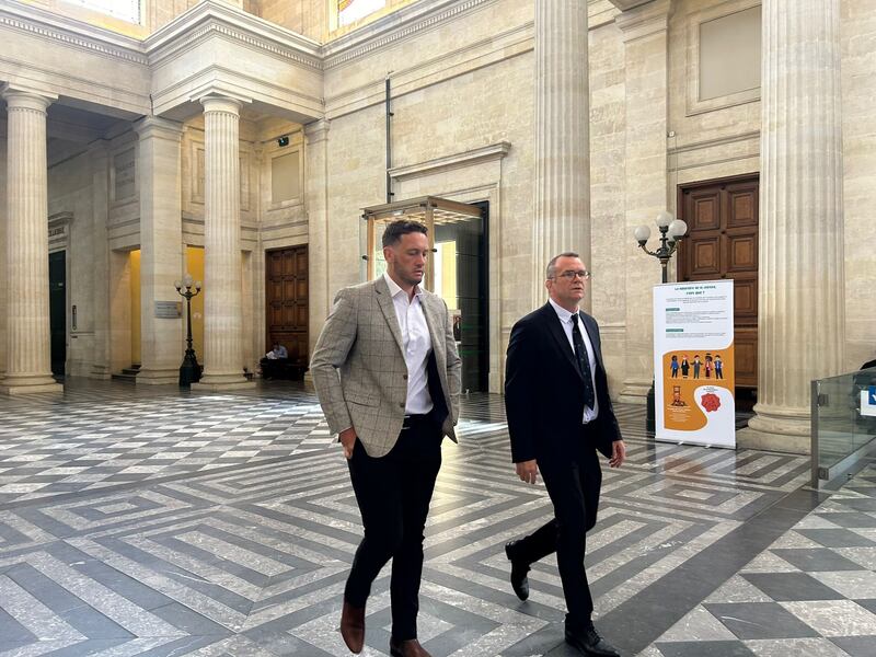 Rory Grice, wearing the brown jacket, who is also accused of rape arriving to court with his lawyer. Photograph: Sharon Gaffney
