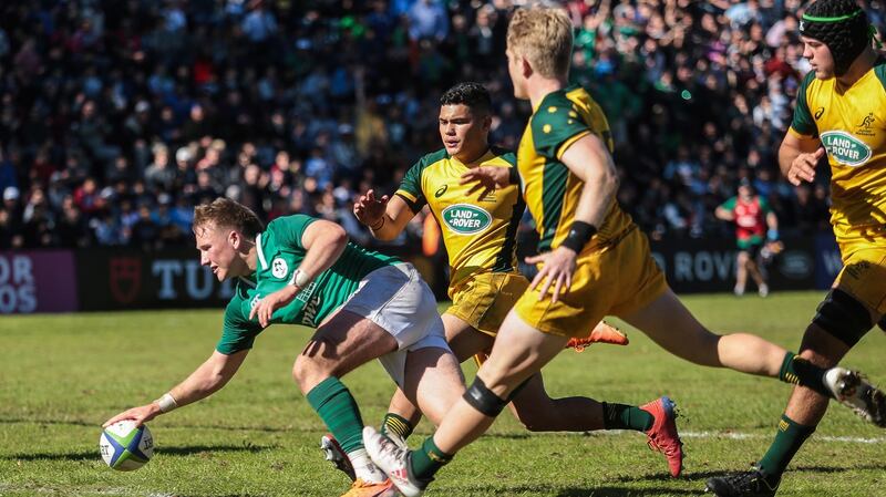 Stewart Moore scores Ireland’s  second try during the World U20 Championship match against Australia at the CRAI Stadium in Sante Fe, Argentina. Photograph: Pablo Gasparini/Inpho