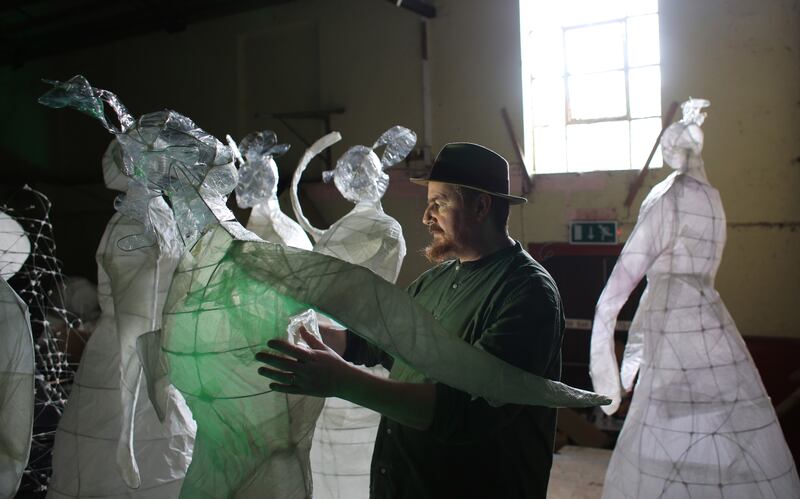 Artist Tom Meskell working on figures for Silva Lumina, which will run at the National Botanic Gardens in January as part of First Fortnight. Photograph: Bryan O'Brien