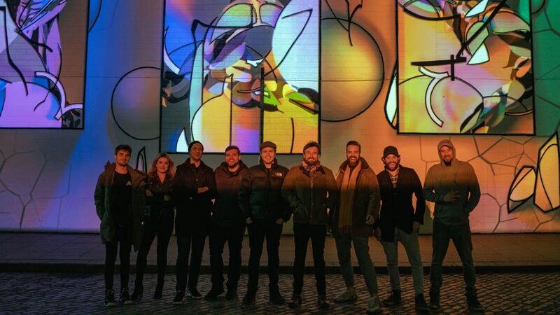 The Algorithm crew with James Early at the Perpetua mural in Smithfield, Dublin. Photograph: Janna Kemperman