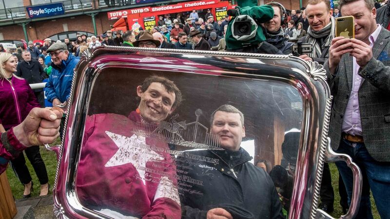 Jockey JJ Slevin and trainer Gordon Elliott celebrate winning the Boylesports Irish Grand National with General Principle. Photograph: Morgan Treacy/Inpho