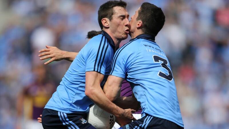 Dublin duo Nicky Devereux and Rory O’Carroll clash heads while contesting a ball during the Leinster SFC semi-final at  Croke Park. Photograph:  Cathal Noonan/Inpho