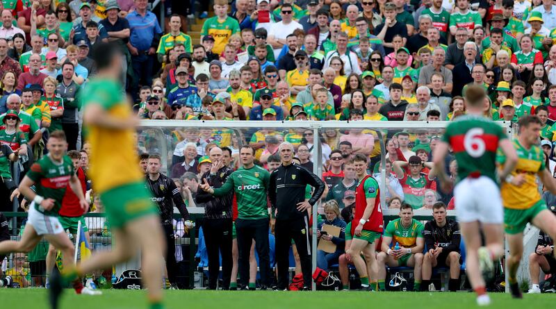 Donegal manager Jim McGuinness looks on from the sideline during last weekend's match against Mayo, which his team won by a point. Photograph: James Crombie/Inpho