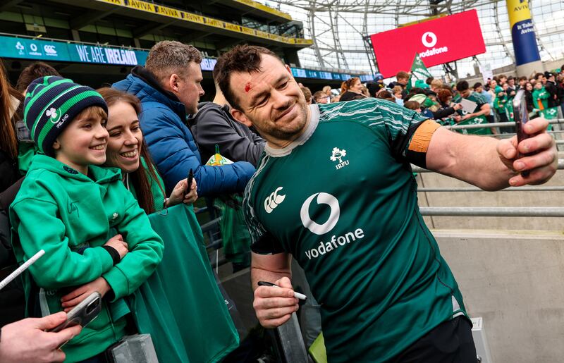 Cian Healy takes a selfie with fans during Ireland's open training session at the Aviva Stadium. Photograph: Ben Brady/Inpho