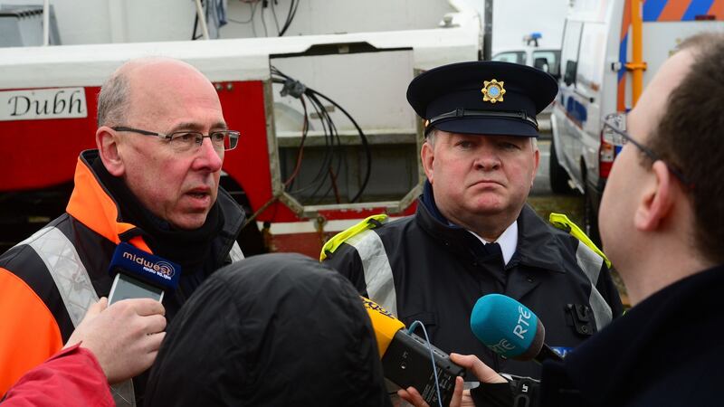Gerard O’Flynn, operations manager of the Irish Coast Guard, and Garda Supt Tony Healy have pledged to continue the search for the missing crewmen. Photograph: Dara Mac Dónaill