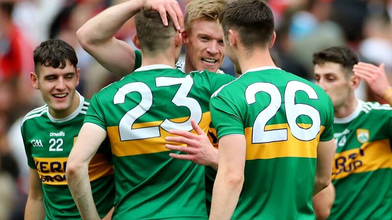Kerry’s Diarmuid O’Connor and David Shaw celebrate their All-Ireland semi-final win over Tyrone with Tommy Walsh at Croke Park on Sunday. Photograph: James Crombie/Inpho