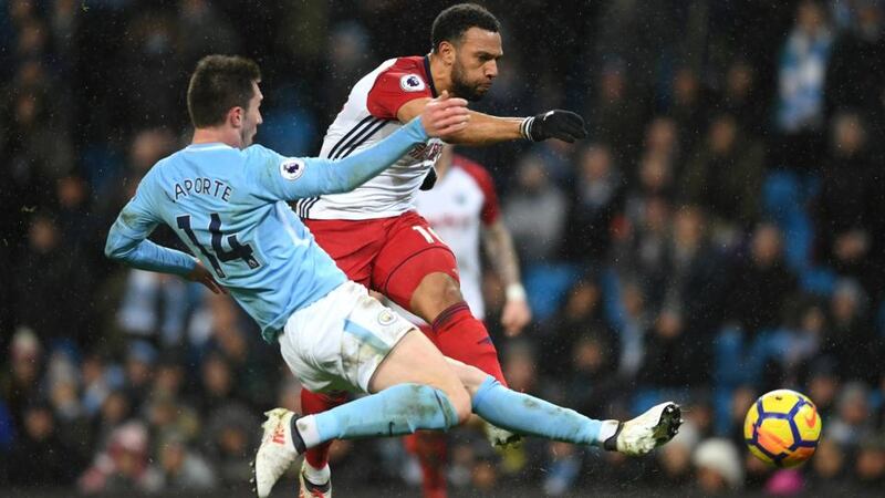 New Manchester City signing Aymeric Laporte challenges Matt Phillips of West Brom during the Premier League game at the Etihad Stadium. Photograph:  Laurence Griffiths/Getty Images