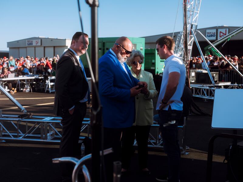 Trump senior staffers Chris LaCivita (centre left) and Susie Wiles centre right) during a rally in Waco, Texas, on March 25th. Photograph: Christopher Lee/New York Times
                      