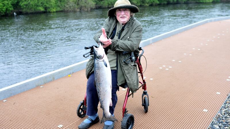 Celia Fry (83) from UK with the first salmon from the disabled anglers’ platform  on River Moy.