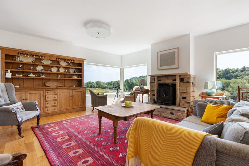 Living area is warmed by an open fire