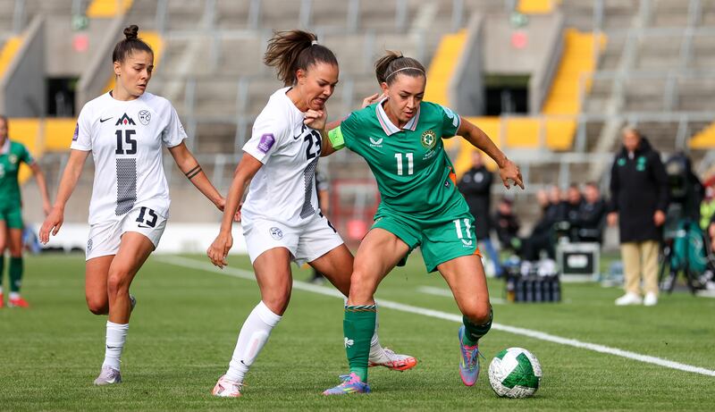 Slovenia's Maja Sternad with Katie McCabe of Ireland. Photograph: Ryan Byrne/Inpho