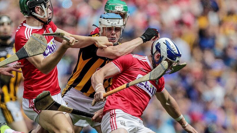Kilkenny’s TJ Reid tackles Sean O’Donoghue of Cork during their All-Ireland SHC quarter-final clash at Croke Park. Photo: Laszlo Geczo/Inpho