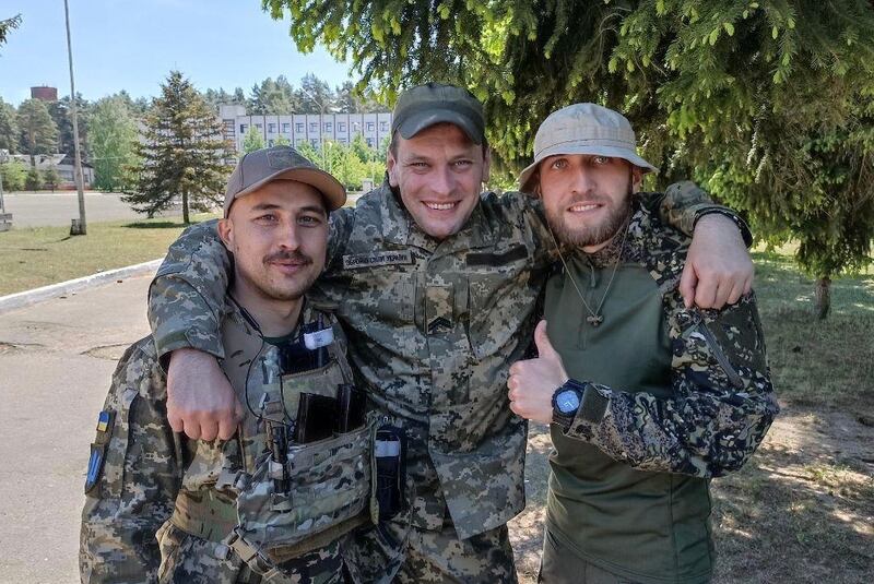 Oleh Kurskyi, Volodymyr Lazor and Marian Stefankiv, three of the five friends from Lviv who joined the Ukrainian army to fight Russia's all-out invasion. Photograph: courtesy of Marian Stefankiv