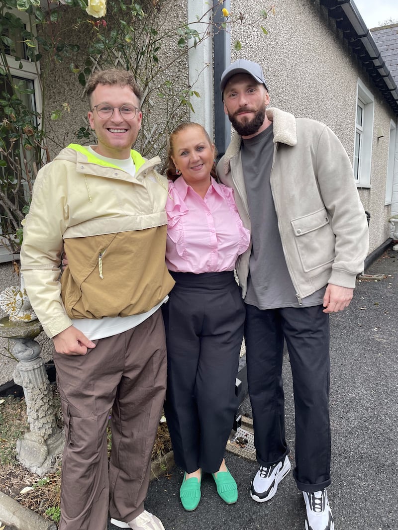Bog Amach: house-hunters Mícheál and Rhys with presenter Emer Mhic an Fhailí