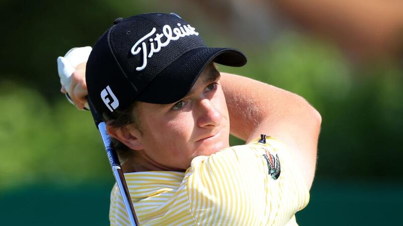 Paul Dunne tees off  during his first round effort in the British  Open at Royal Liverpool Golf Club, Hoylake.  The Greystones amateur opened with a commendable 75. Photograph: PA