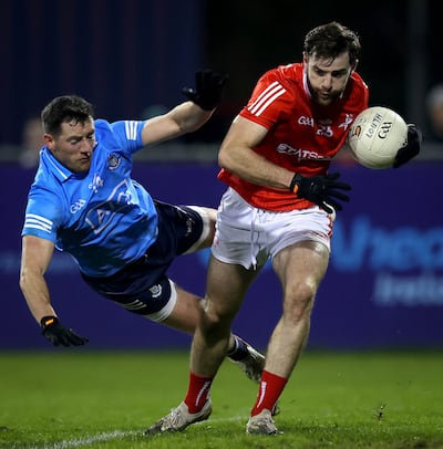 Dermot Campbell of Louth in action against Dublin. Photograph: Ryan  Byrne/Inpho