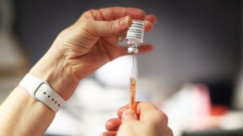 The Oxford/AstraZeneca Covid-19 vaccine is loaded into a syringe before being administered to a patient at Falls Surgery on the Falls Road, Belfast this week. Photograph: Liam McBurney/PA WIRE