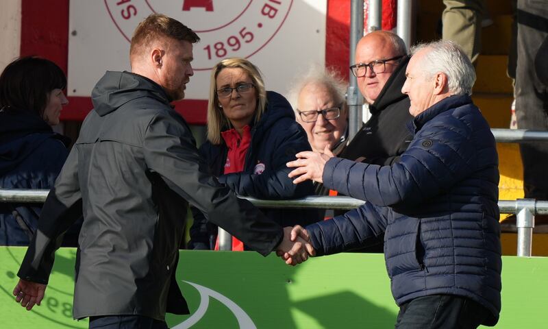 Shelbourne manager Damien Duff and Galway manager John Caulfield shake hands after the game. Photograph: James Lawlor/Inpho
