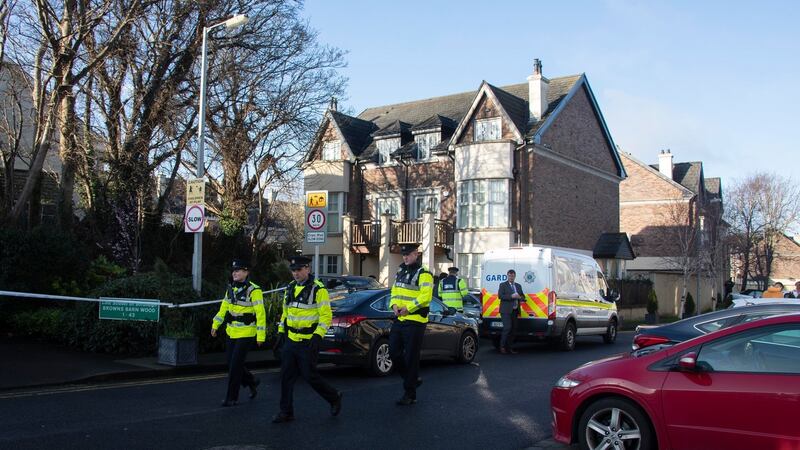 Gardaí  at the scene of the fatal stabbing at Browns Barn Wood, Kingswood in Co Dublin. Photograph: Collins