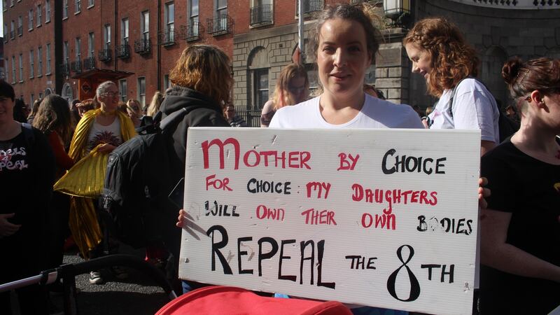 A mother with her pram makes her views known on Parnell Square ahead of the March for Choice in Dublin. Photograph: Ronan McGreevy