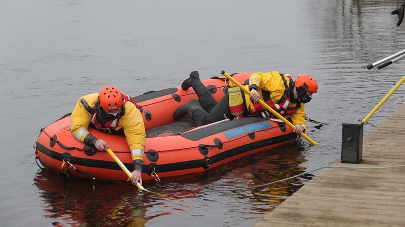Civil Defence members search the river Barrow near Ardreigh Lock, outside Athy, Co Kildare. Photograph: Colin Keegan/Collins