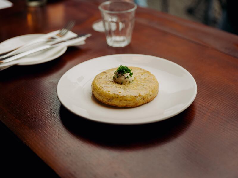  The potato-and-onion tortilla served at Uno Mas. The wine list places a special emphasis on the Spanish regions of Galicia and Bierzo. Photograph: Ellius Grace/the New York Times