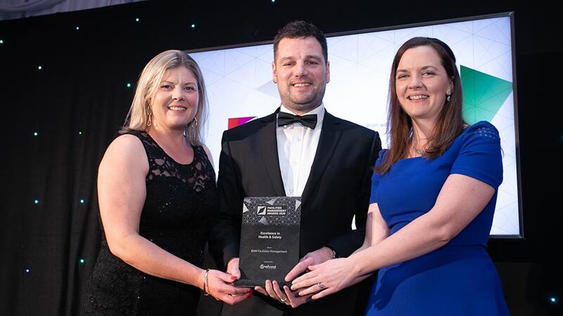 Garreth Ritchie, Commercial Sales Manager, Greyhound Recycling presents the Excellence in Health & Safety award to Triona Sheedy & Gráine de Mórdha, BAM Facilities Management Ireland.