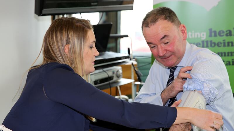 Jon Cruddas MP gets his blood pressure checked by Dr Aisling Butler.