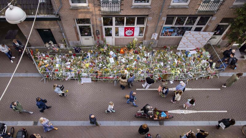 People lay flowers for murdered Dutch crime journalist Peter R de Vries at the back of the Lange Leidsedwarsstraat street in the centre of Amsterdam on July 15th. Photograph: Ramon van Flymen/ANP/AFP via Getty