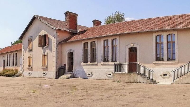 Old school: large former school ripe for conversion near Massignac town, France.