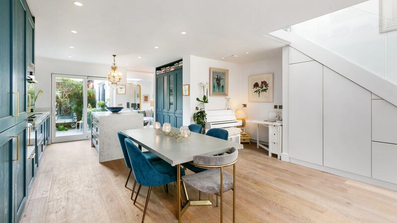Dining area with understairs storage
