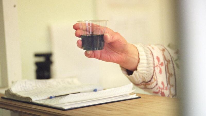 Dispensing methadone doses. Photograph: Eric Luke
