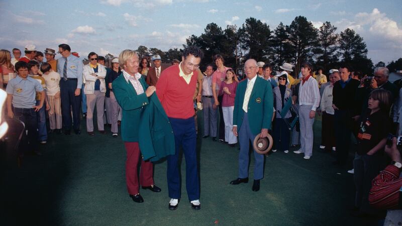 Archer is congratulated by Tom Weiskopf on the 18th. Photo: Getty Images