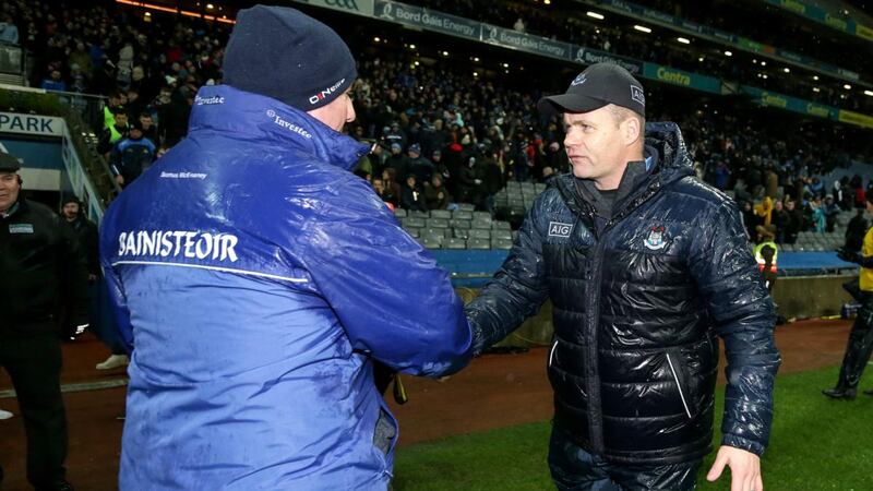 Monaghan manager Séamus McEnaney shakes hands with Dublin  counterpart  Dessie Farrell after the game. Photograph: Laszlo Geczo/Inpho