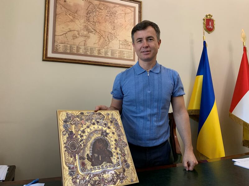 Oleg Bryndak, deputy mayor of Odesa, holds an icon which is said to have stopped an onslaught by Turkish forces during the Crimean War in the 19th century. Photograph: Lara Marlowe