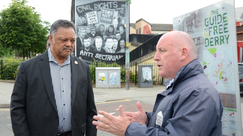 Veteran US civil rights activist the Rev Jesse Jackson (left) tours the Bogside of Derry in June 2017 with guide Paul Doherty, whose father Patrick was killed on Bloody Sunday in January 1972. File photograph: Freya McClements