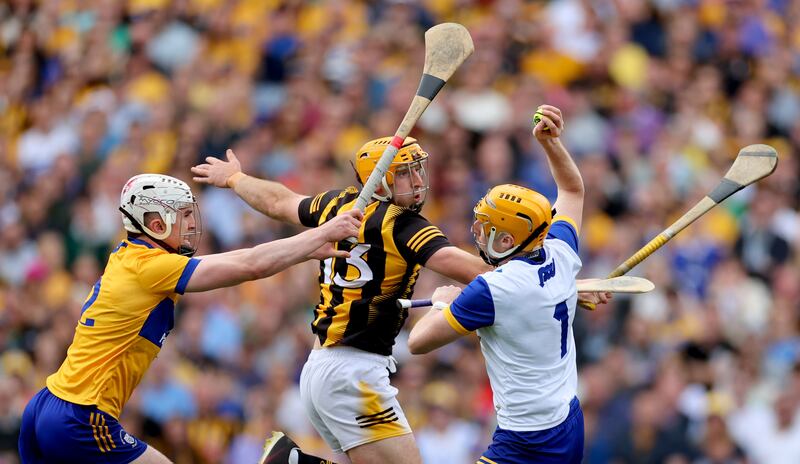 Billy Ryan of Kilkenny puts Clare goalkeeper Eibhear Quilligan under pressure. Photograph: James Crombie/INPHO